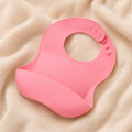 Silicone Catch Bib in Soft Pink – main view